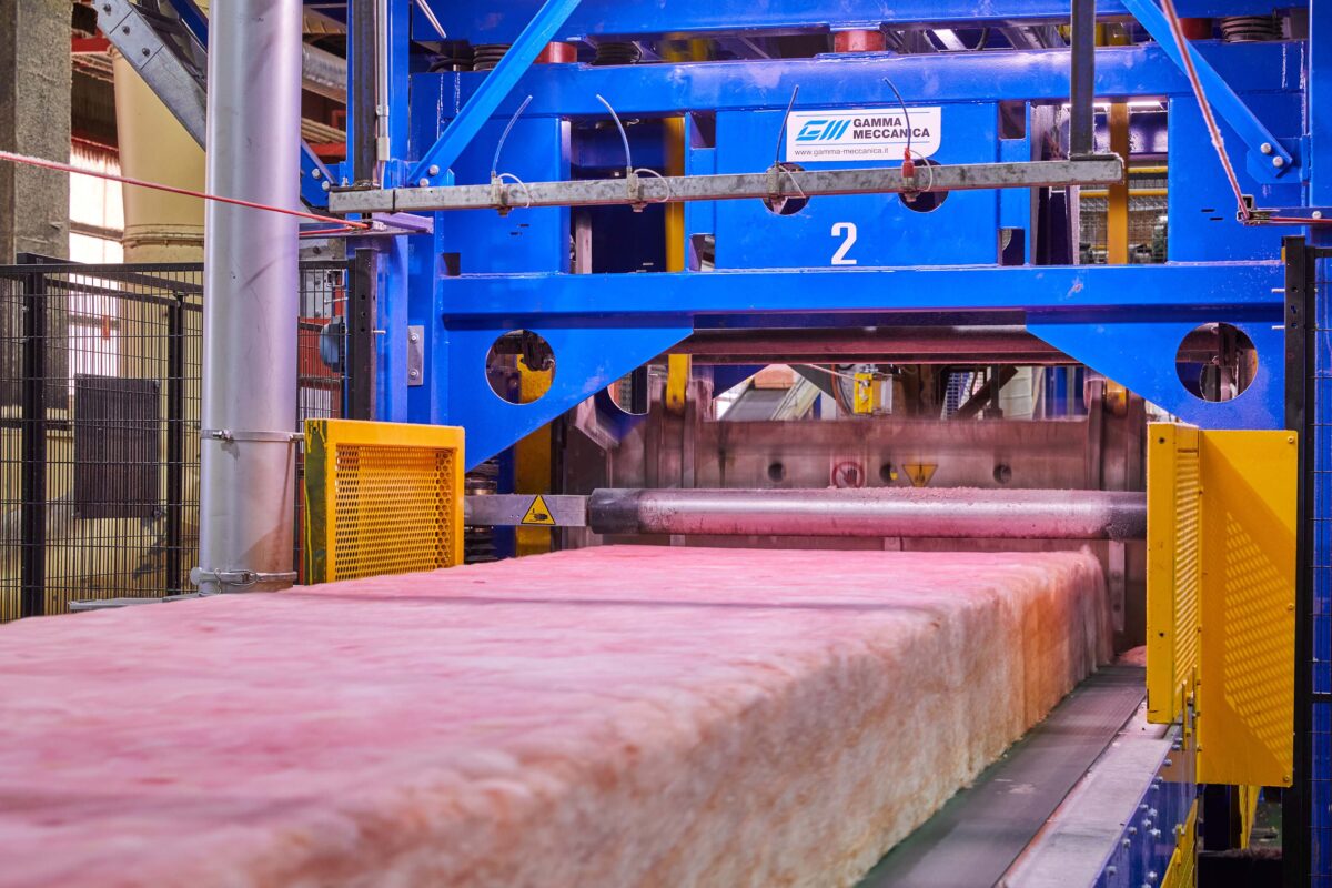 Pink insulation being produced. Stage before cutting